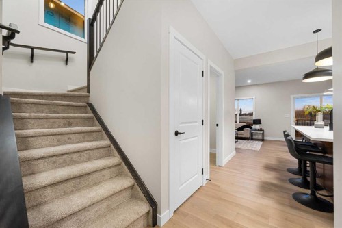 128 Versant Point Sw, Calgary, AB - Indoor Photo Showing Other Room