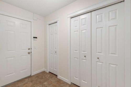 38 Evansbrooke Manor Nw, Calgary, AB - Indoor Photo Showing Other Room