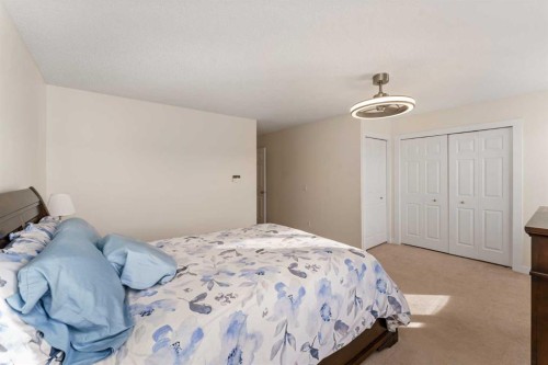 38 Evansbrooke Manor Nw, Calgary, AB - Indoor Photo Showing Bedroom