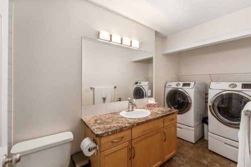 38 Evansbrooke Manor Nw, Calgary, AB - Indoor Photo Showing Laundry Room
