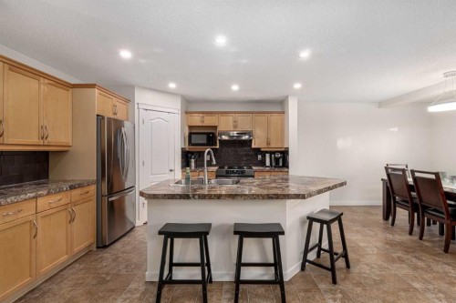 38 Evansbrooke Manor Nw, Calgary, AB - Indoor Photo Showing Kitchen With Double Sink With Upgraded Kitchen