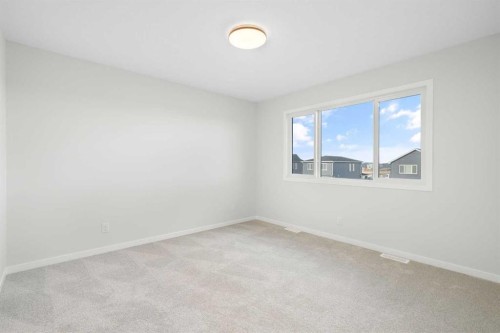 13 Creekview Manor Sw, Calgary, AB - Indoor Photo Showing Other Room