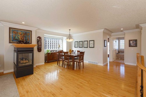 53 Prominence Path Sw, Calgary, AB - Indoor With Fireplace