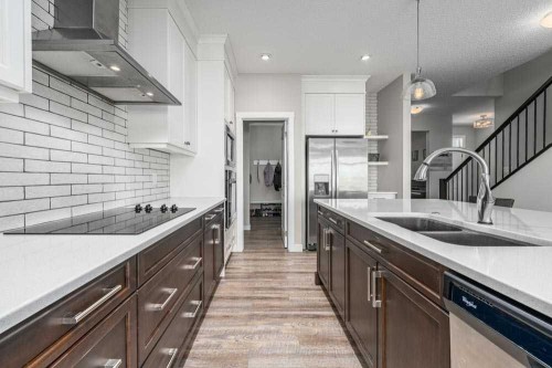 125 Sage Bluff Close Nw, Calgary, AB - Indoor Photo Showing Kitchen With Double Sink With Upgraded Kitchen
