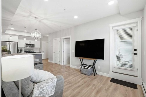 203-19661 40 Street Se, Calgary, AB - Indoor Photo Showing Other Room