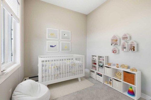 203-19661 40 Street Se, Calgary, AB - Indoor Photo Showing Bedroom