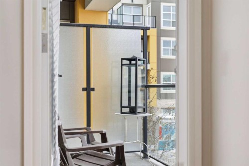 203-19661 40 Street Se, Calgary, AB - Indoor Photo Showing Other Room