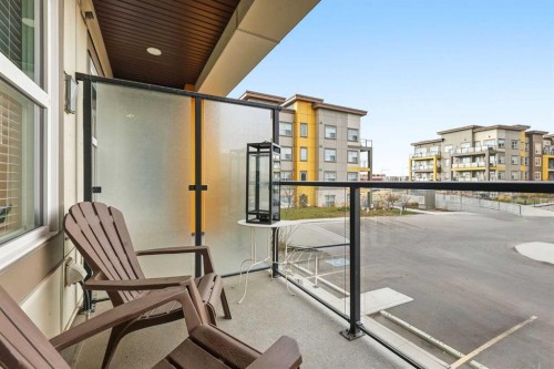 203-19661 40 Street Se, Calgary, AB - Outdoor With Balcony With Exterior