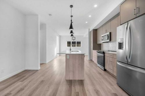 64 Creekside Boulevard Sw, Calgary, AB - Indoor Photo Showing Kitchen