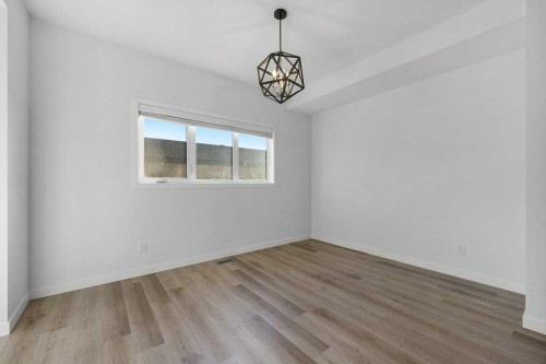 64 Creekside Boulevard Sw, Calgary, AB - Indoor Photo Showing Other Room