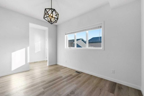 64 Creekside Boulevard Sw, Calgary, AB - Indoor Photo Showing Other Room