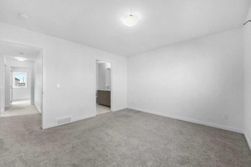 64 Creekside Boulevard Sw, Calgary, AB - Indoor Photo Showing Other Room