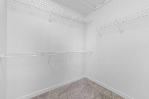 64 Creekside Boulevard Sw, Calgary, AB - Indoor With Storage