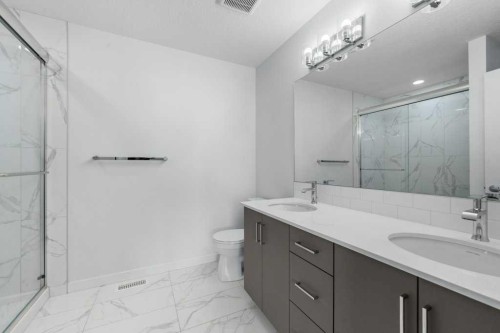 64 Creekside Boulevard Sw, Calgary, AB - Indoor Photo Showing Bathroom