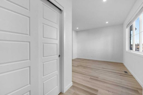 64 Creekside Boulevard Sw, Calgary, AB - Indoor Photo Showing Other Room