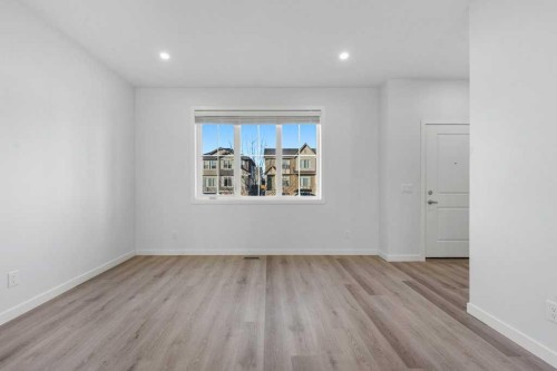 64 Creekside Boulevard Sw, Calgary, AB - Indoor Photo Showing Other Room