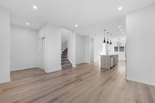 64 Creekside Boulevard Sw, Calgary, AB - Indoor Photo Showing Other Room