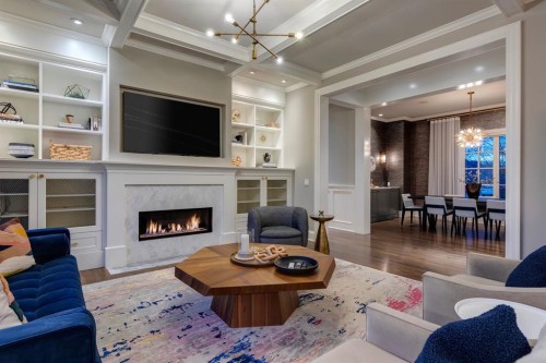40 Mary Dover Drive Sw, Calgary, AB - Indoor Photo Showing Living Room With Fireplace