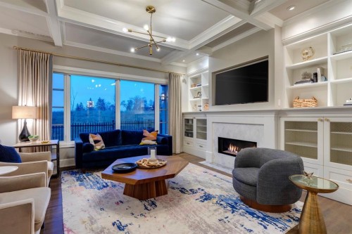 40 Mary Dover Drive Sw, Calgary, AB - Indoor Photo Showing Living Room With Fireplace