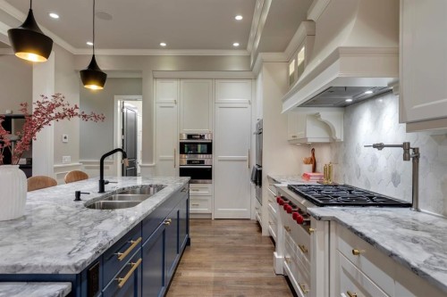 40 Mary Dover Drive Sw, Calgary, AB - Indoor Photo Showing Kitchen With Double Sink With Upgraded Kitchen