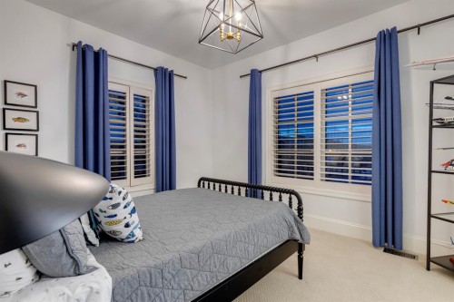 40 Mary Dover Drive Sw, Calgary, AB - Indoor Photo Showing Bedroom