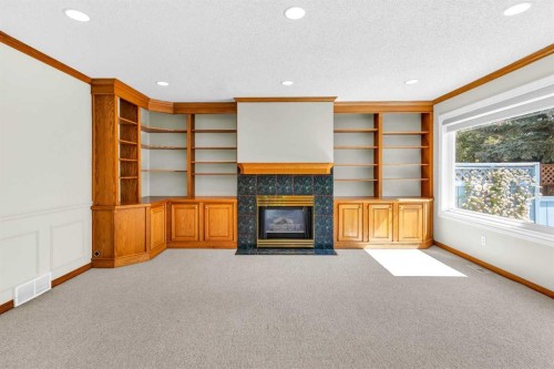 159 Hampshire Grove Nw, Calgary, AB - Indoor Photo Showing Other Room With Fireplace