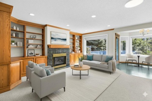 159 Hampshire Grove Nw, Calgary, AB - Indoor Photo Showing Living Room With Fireplace