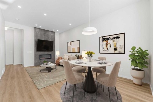 259 Magnolia Drive Se, Calgary, AB - Indoor Photo Showing Dining Room With Fireplace