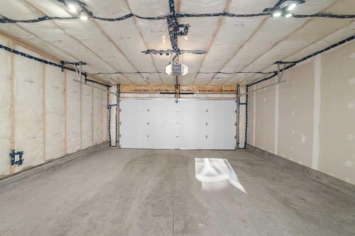 259 Magnolia Drive Se, Calgary, AB - Indoor Photo Showing Garage