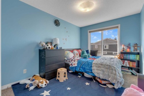 505 Redstone Drive Ne, Calgary, AB - Indoor Photo Showing Bedroom