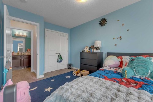 505 Redstone Drive Ne, Calgary, AB - Indoor Photo Showing Bedroom