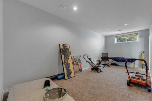 505 Redstone Drive Ne, Calgary, AB - Indoor Photo Showing Gym Room