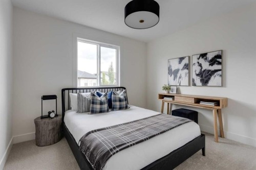 46 Heritage Close, Cochrane, AB - Indoor Photo Showing Bedroom