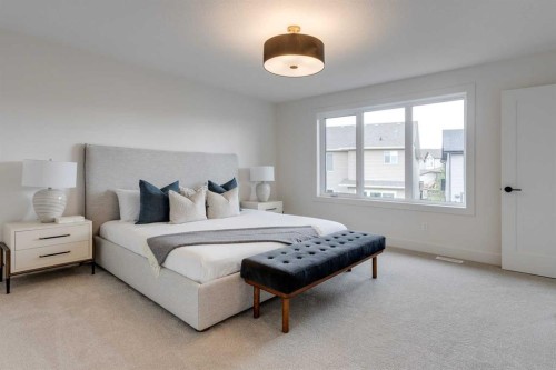 46 Heritage Close, Cochrane, AB - Indoor Photo Showing Bedroom