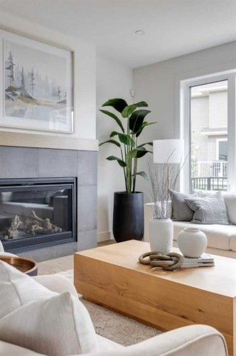 46 Heritage Close, Cochrane, AB - Indoor Photo Showing Living Room With Fireplace