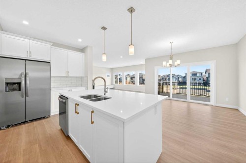 1642 Baywater Street Sw, Airdrie, AB - Indoor Photo Showing Kitchen With Stainless Steel Kitchen With Double Sink With Upgraded Kitchen
