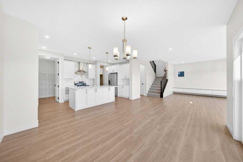 1642 Baywater Street Sw, Airdrie, AB - Indoor Photo Showing Kitchen With Upgraded Kitchen