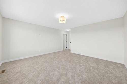 1642 Baywater Street Sw, Airdrie, AB - Indoor Photo Showing Other Room