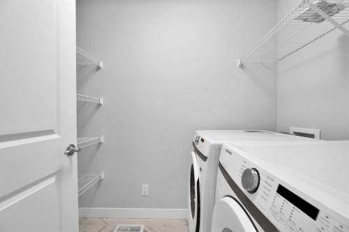 349 Calhoun Common Ne, Calgary, AB - Indoor Photo Showing Laundry Room