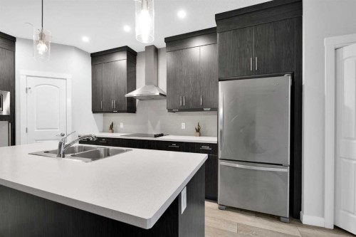 349 Calhoun Common Ne, Calgary, AB - Indoor Photo Showing Kitchen With Double Sink With Upgraded Kitchen