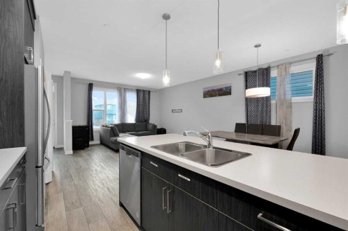 349 Calhoun Common Ne, Calgary, AB - Indoor Photo Showing Kitchen With Double Sink With Upgraded Kitchen