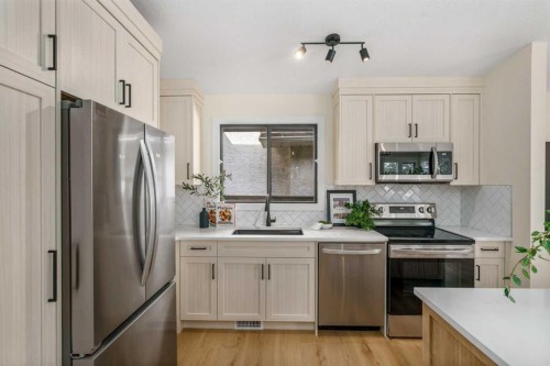 204 Mckerrell Way Se, Calgary, AB - Indoor Photo Showing Kitchen With Upgraded Kitchen