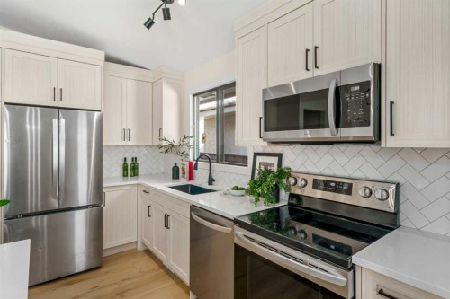 204 Mckerrell Way Se, Calgary, AB - Indoor Photo Showing Kitchen With Upgraded Kitchen