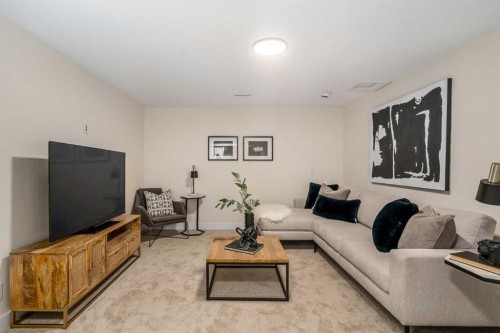 204 Mckerrell Way Se, Calgary, AB - Indoor Photo Showing Living Room
