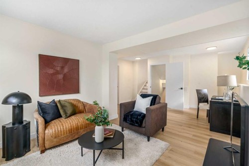 204 Mckerrell Way Se, Calgary, AB - Indoor Photo Showing Living Room