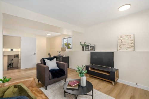 204 Mckerrell Way Se, Calgary, AB - Indoor Photo Showing Living Room