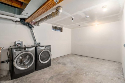 204 Mckerrell Way Se, Calgary, AB - Indoor Photo Showing Laundry Room