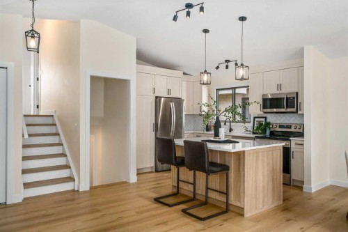 204 Mckerrell Way Se, Calgary, AB - Indoor Photo Showing Kitchen With Upgraded Kitchen