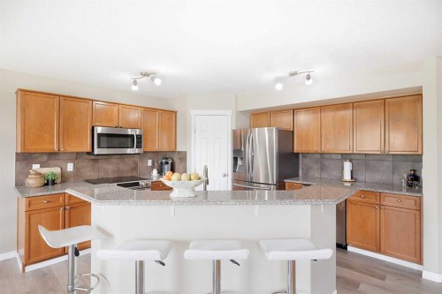 130 Morningside Point Sw, Airdrie, AB - Indoor Photo Showing Kitchen With Stainless Steel Kitchen