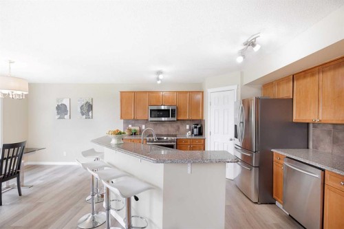 130 Morningside Point Sw, Airdrie, AB - Indoor Photo Showing Kitchen With Stainless Steel Kitchen